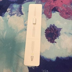 This is an Apple Pen adapter and Apple pen cap